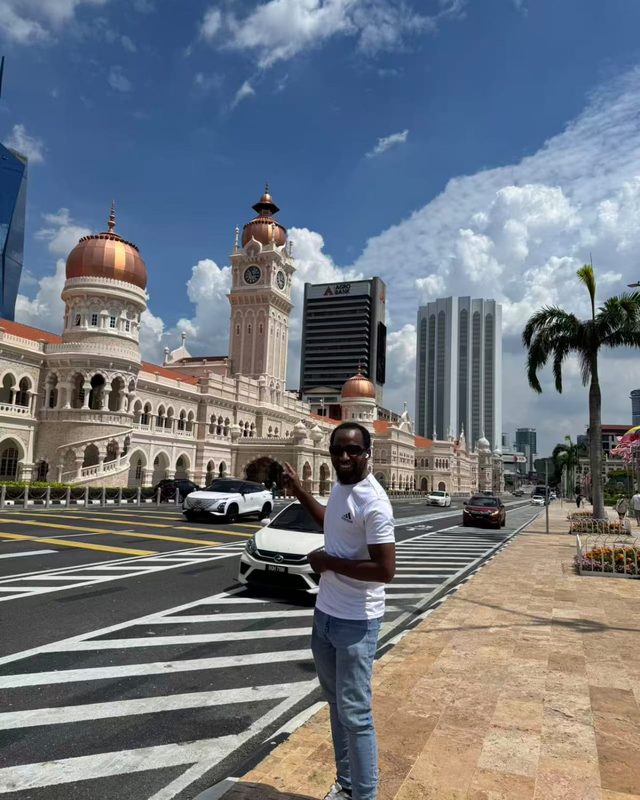 Bah outside a historic colonial era building on a sunny day